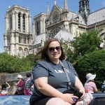 Sara with Notre Dame in the background